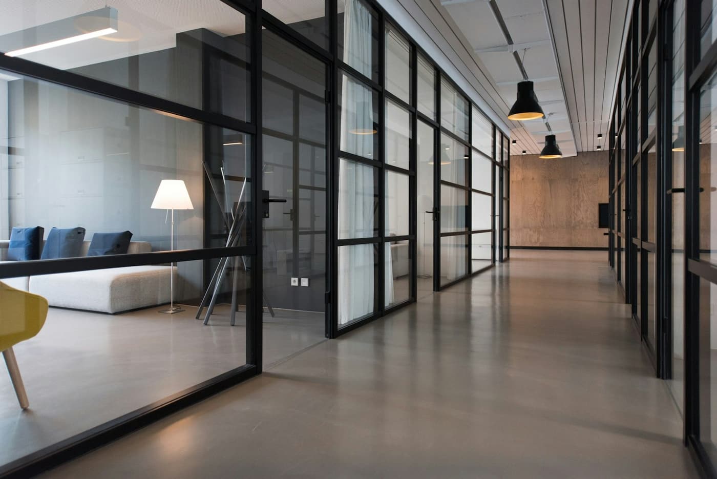 A modern workspace where a paid-media strategist reviews Google Ads campaign performance